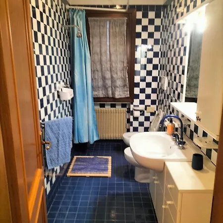 Quarto em Acomodações Particulares Locazione Turistica Gisella